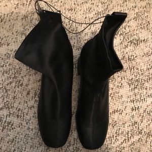 Black satin booties. NWT